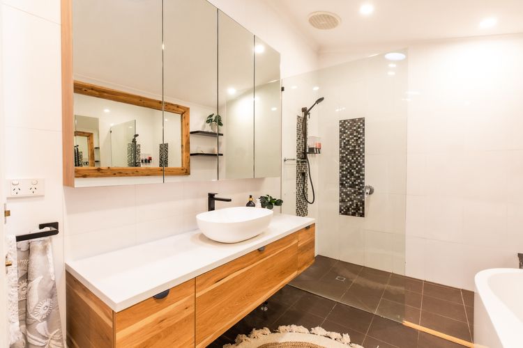 Bathroom with bath and shower