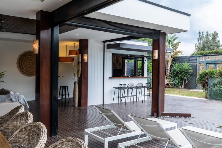 Outdoor seating by the pool