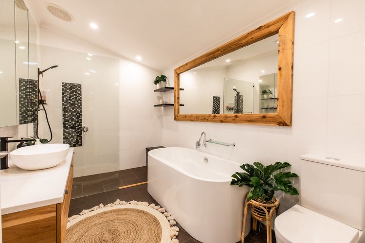 Bathroom with bath and shower