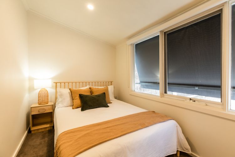 Bedroom four with queen bed and single bed