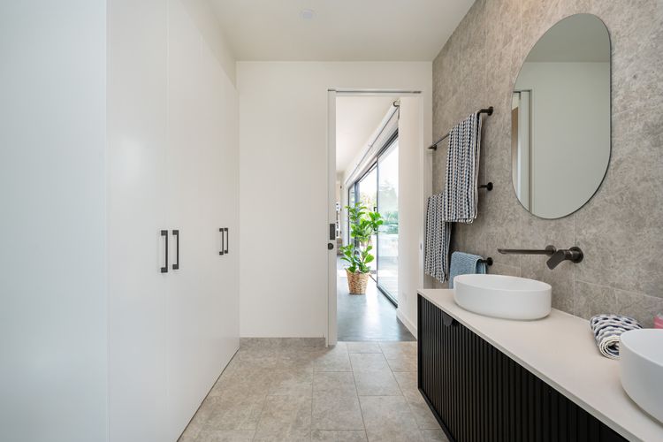 Bathroom with European laundry