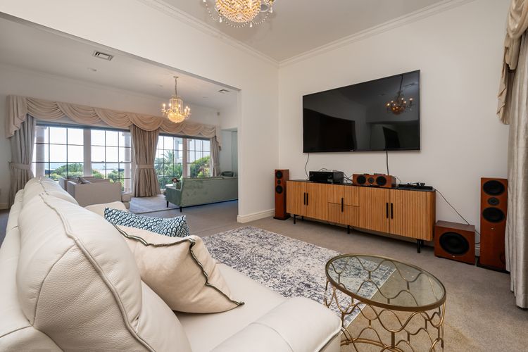 Fourth living area with large screen TV for movie nights