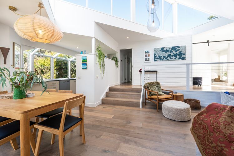 Downstairs, showcasing dining and lounge area 