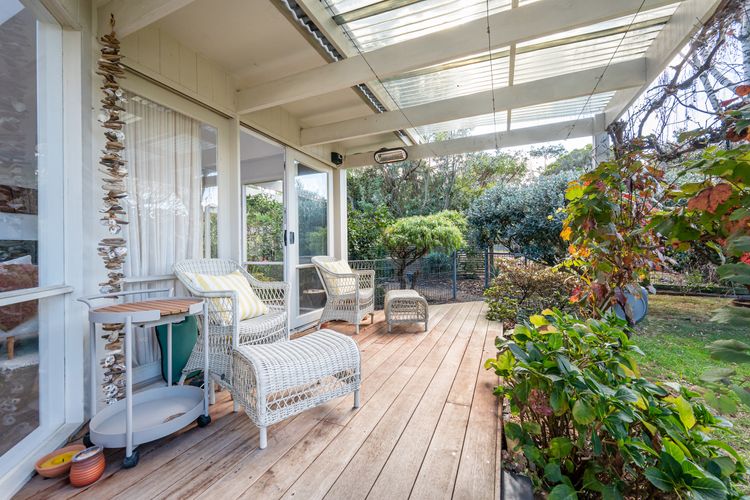 Outdoor seating area with garden view 