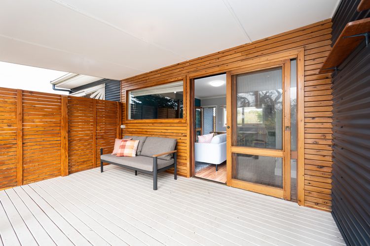 Property entrance with seating area outside 