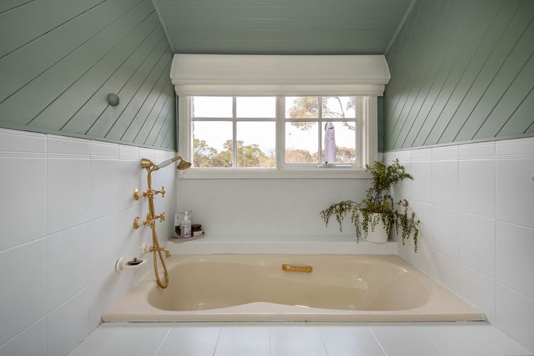 Bathroom with bath 