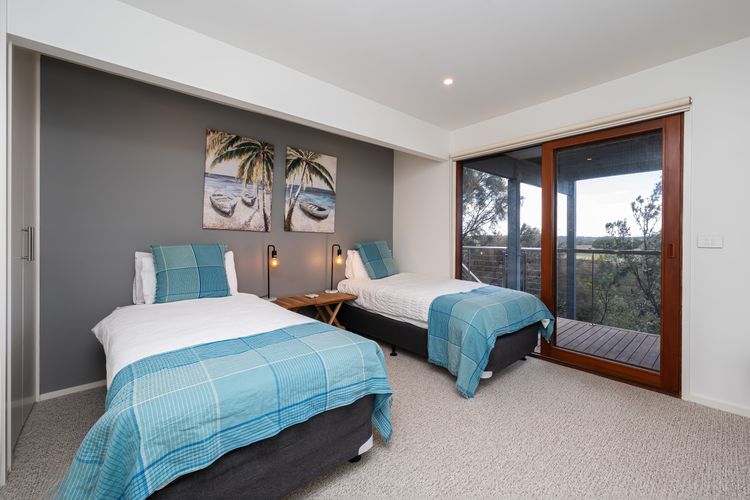 Bedroom three with two king single beds 