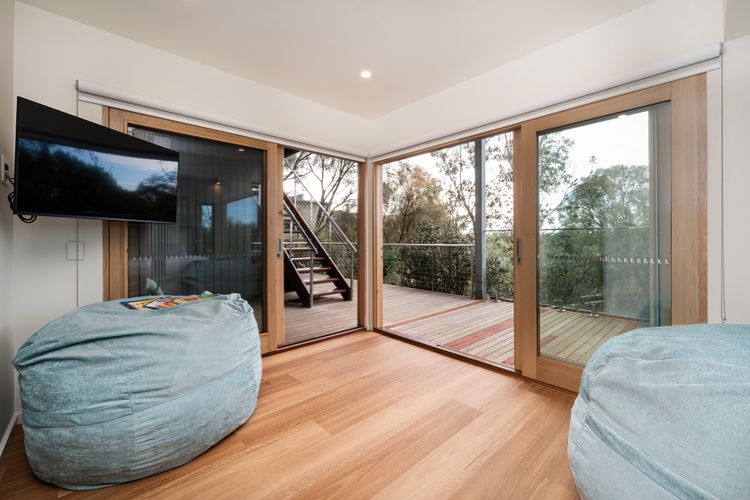 Bunk room with smart TV and bean bags, perfect teenagers retreat