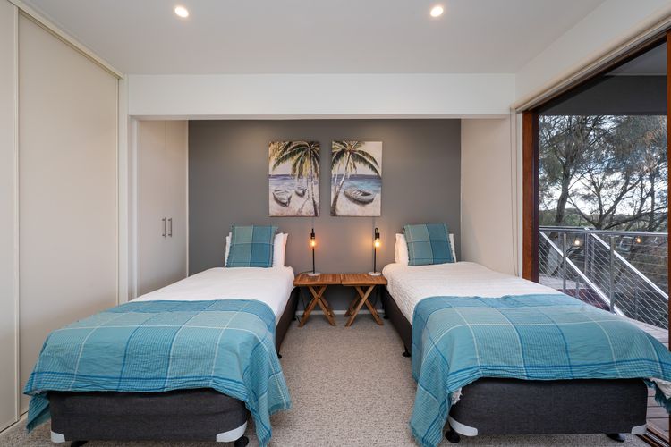 Bedroom three with two king single beds 