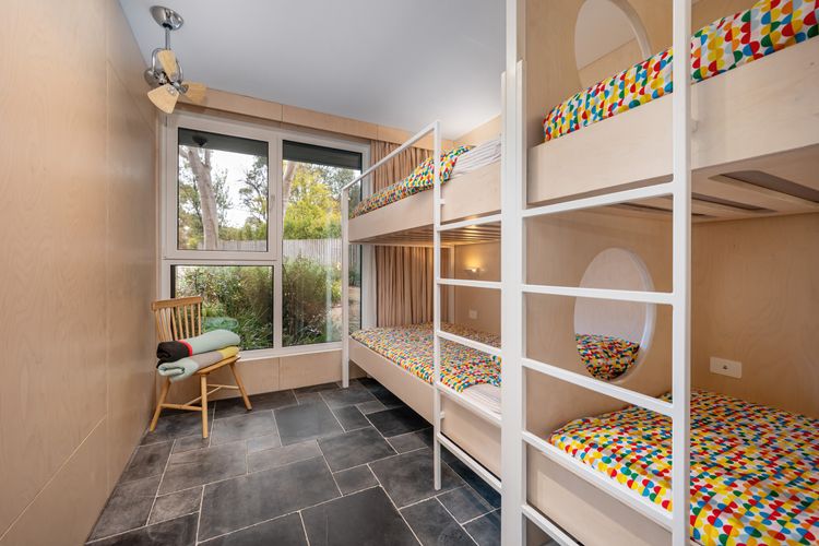 Downstairs bunkroom with four king-singles