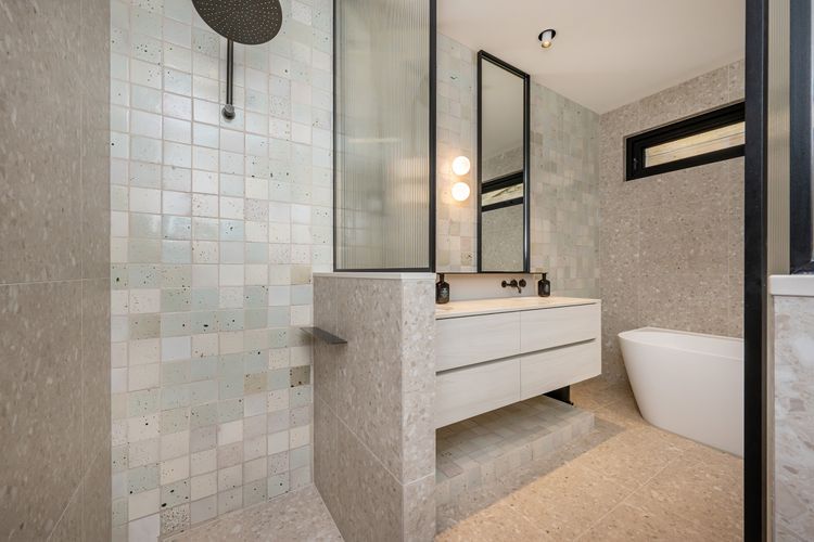 Stunning bathroom with heated floor bath and shower 