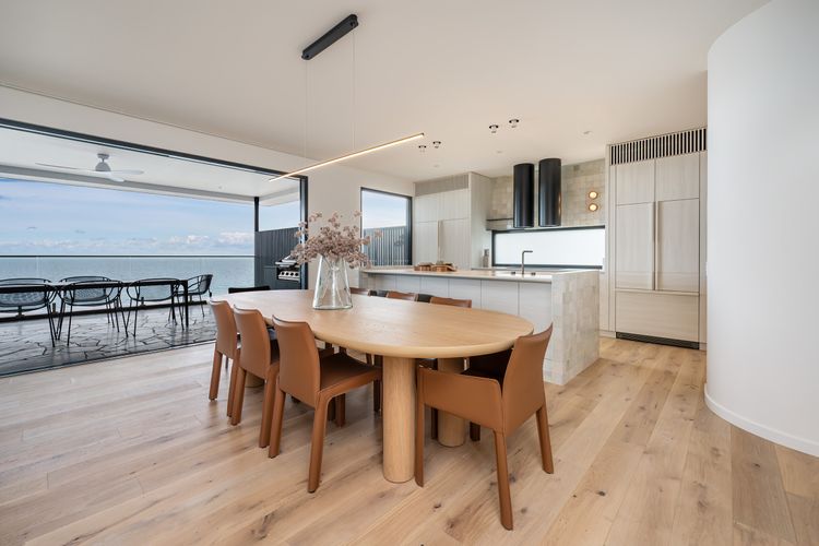 Kitchen, dining leading out to outdoor dining and bbq area. Look at that view!