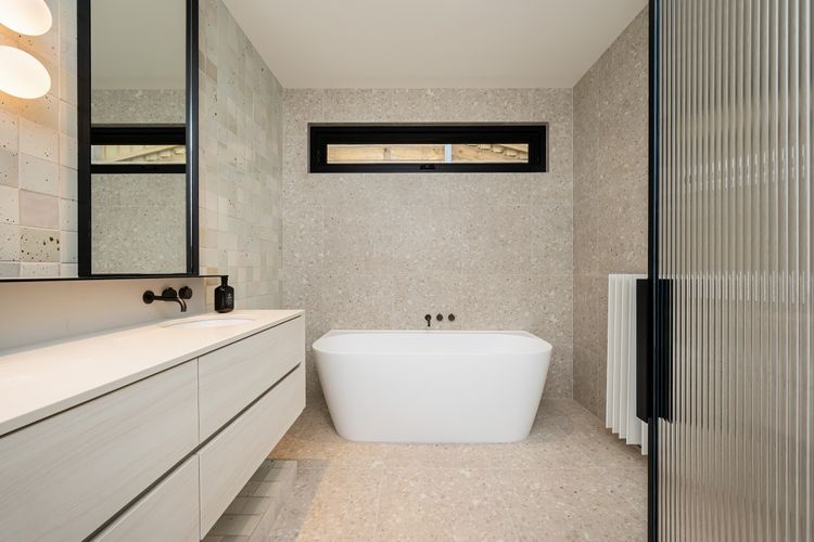 main bathroom with heated floor and towel rails