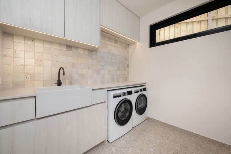 Spacious laundry with washer and dryer