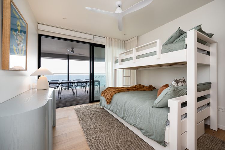 Bedroom four with tri bunk and single trundle bed 