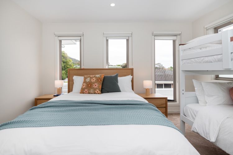 Bedroom three with Queen bed and single bunk beds