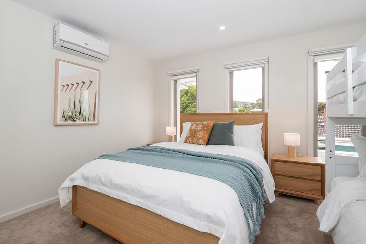 Bedroom three with Queen bed and single bunk beds
