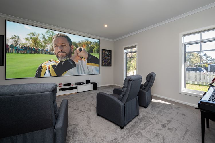 hige projector screen in movie room