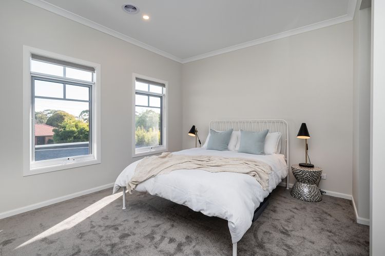 Bedroom three with queen bed
