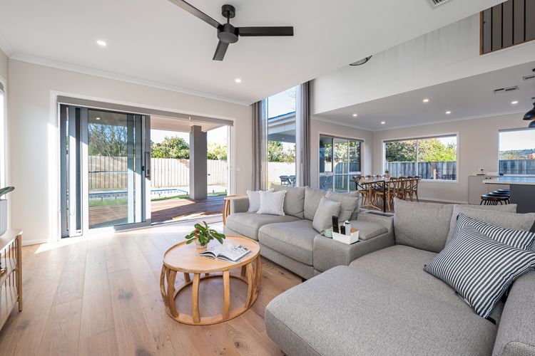 Light and bright living spaces looking over the pool area