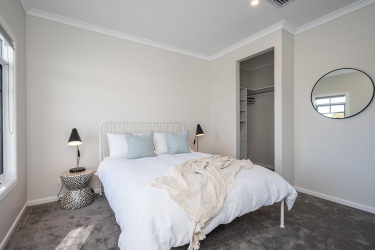 Bedroom three with queen bed