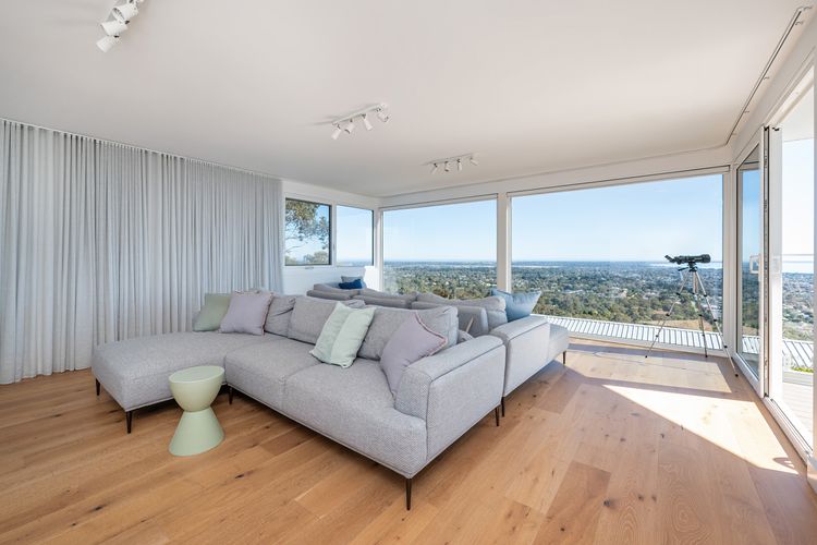 Second living area upstairs with large smart tv and that incredible view