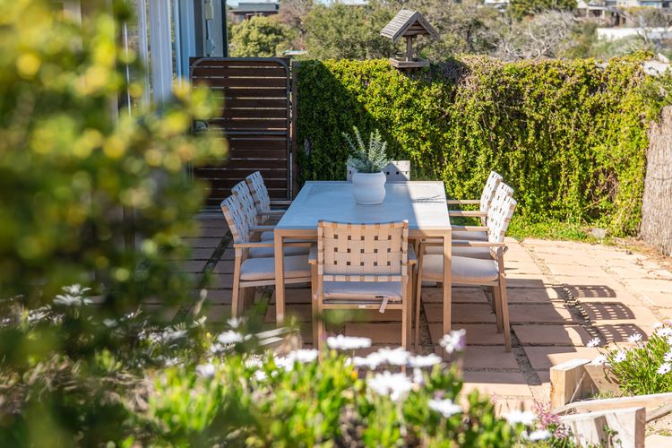 Seating area surrounded by the garden