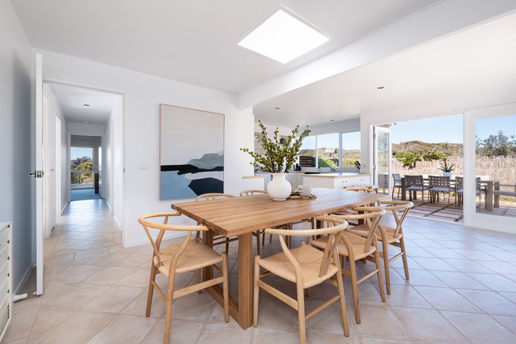 Light and bright living. Dining with seating for 8