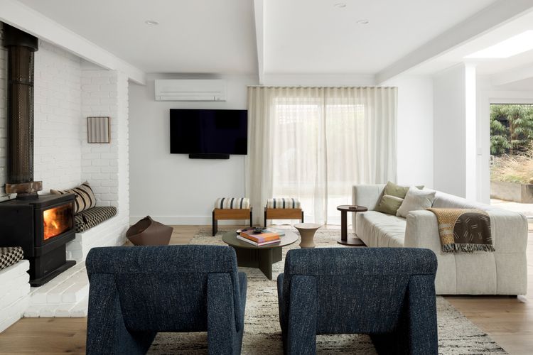 Lounge area with a fireplace and a smart TV