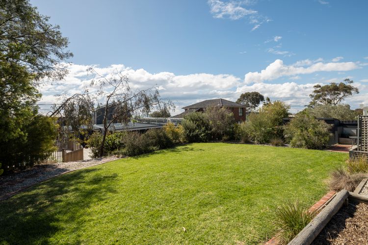Spacious lawn area, perfect for kids to run and play.