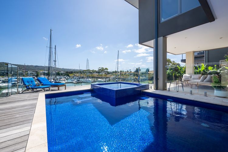 A solar heated pool and a gas heated spa