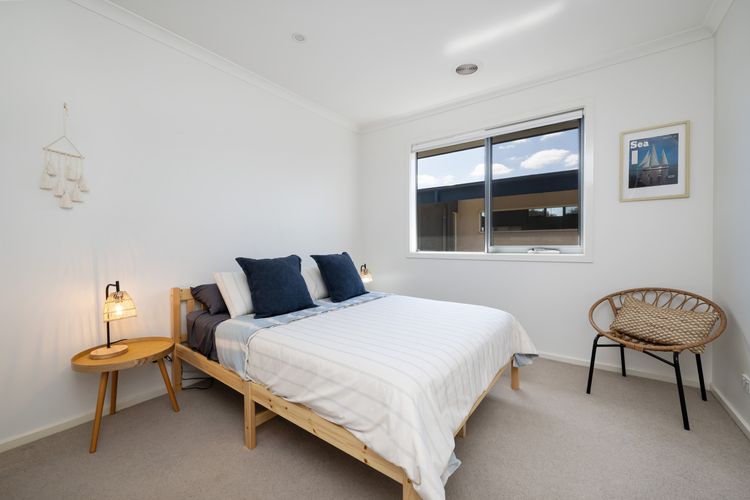 Bedroom three with queen bed