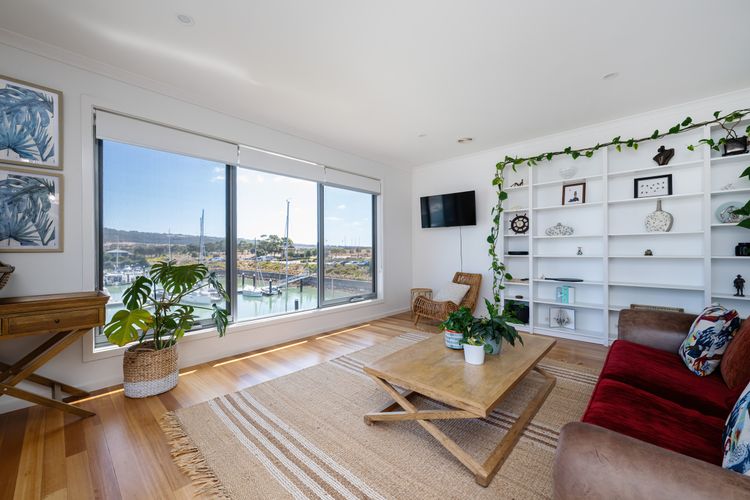 Upstairs Lounge area with smart TV and views out over the Marina