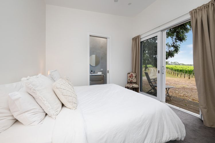 Bedroom one with queen bed 