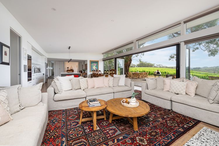 Living space with plenty of seating around the fireplace 