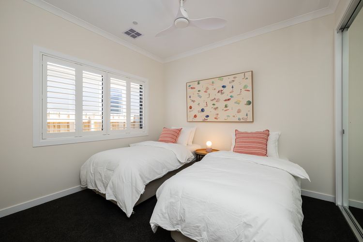 Bedroom five with two single beds 
