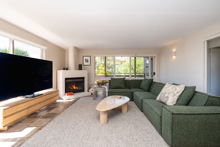 Lounge area with the fireplace and TV