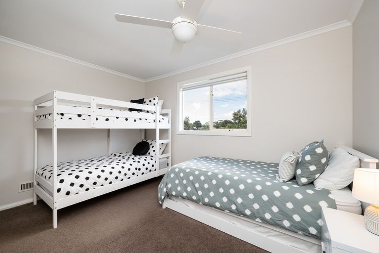 Bedroom three complete with bunkbeds, single bed and trundle. Located on the first floor.