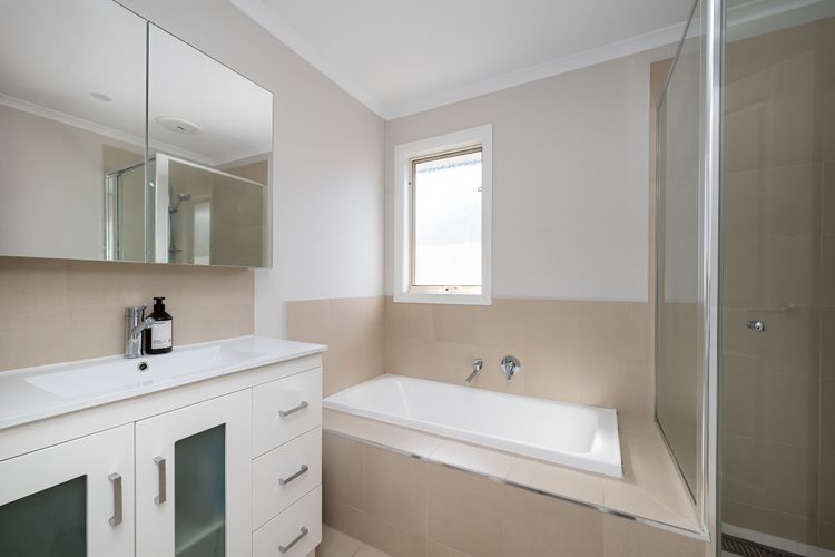 Family bathroom, with bath, shower and separate powder room. Located on the first floor.