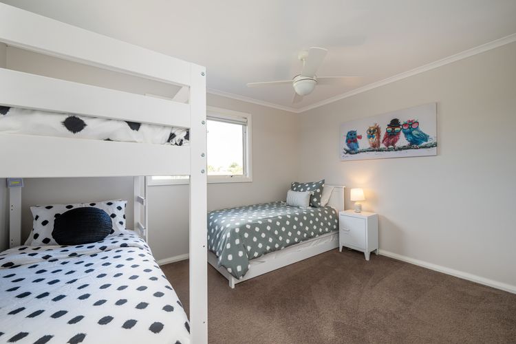 Bedroom three with bunk beds, single bed and trundle