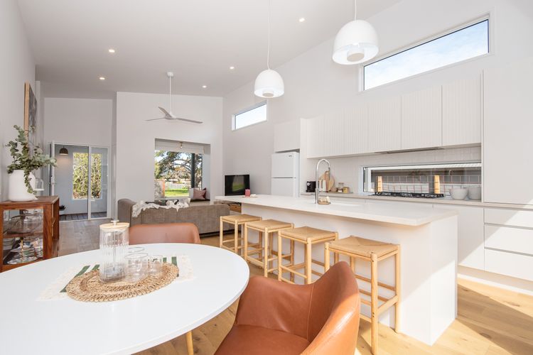 Modern light and bright living space with smart tv and fully equipped kitchen 
