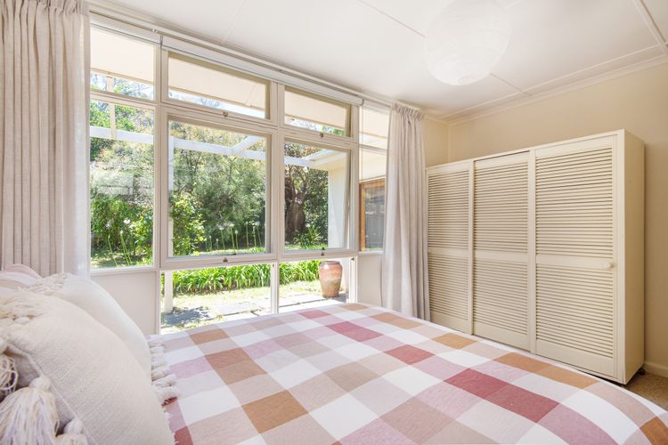 Queen bedroom with cabinets