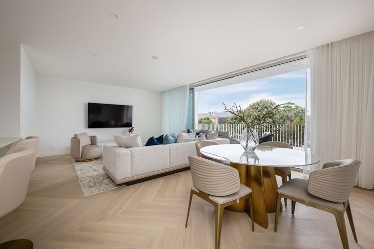 Lounge Opening to private balcony with water views 