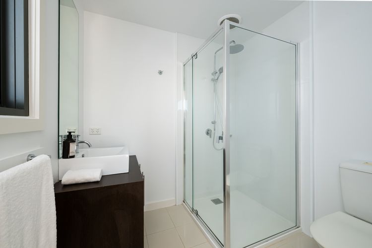 Ensuite bathroom with shower and toilet