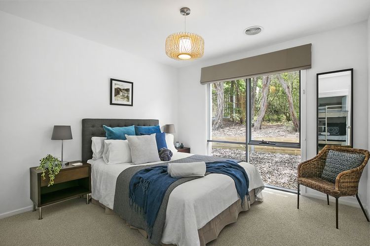 Enjoy the elegant fixtures in this bedroom