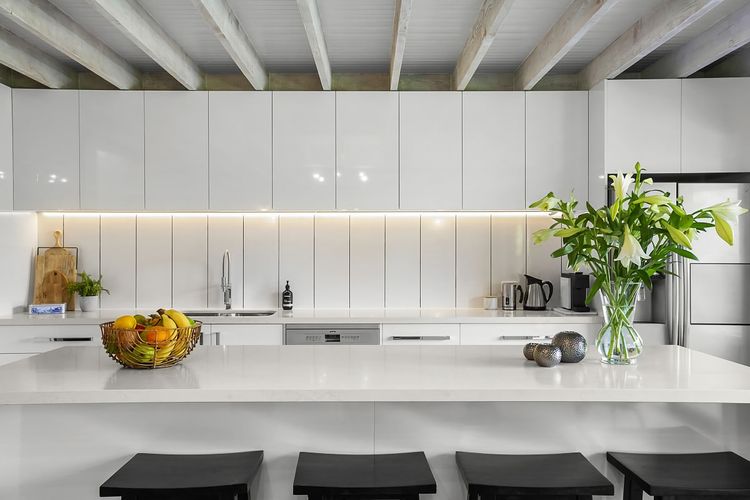 Enjoy cooking in our modern kitchen, boasting sleek countertops and state-of-the-art appliances.