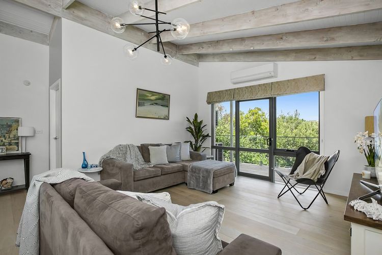 Enjoy the plush sofas adorned with soft cushions, perfect for gatherings with loved ones.