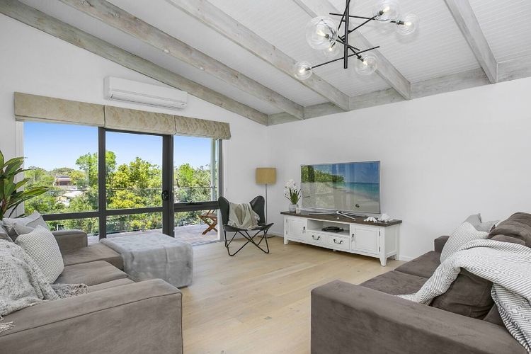 Step into our elegant living room with a big TV, perfect for gathering with your love ones.