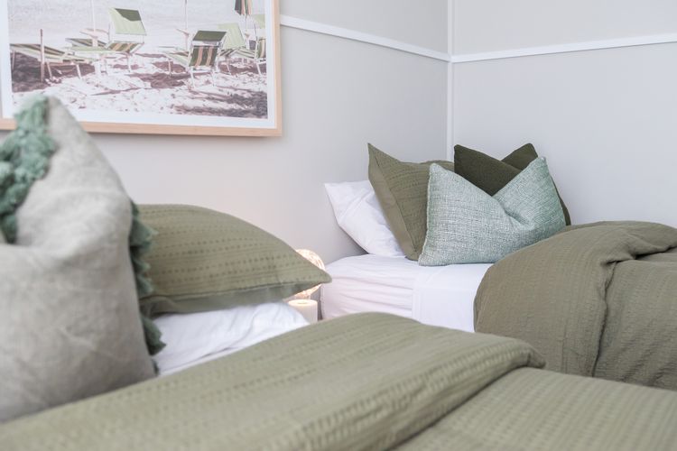 Enjoy the plush pillows and cosy beds.