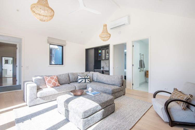 Light filled lounge with fireplace